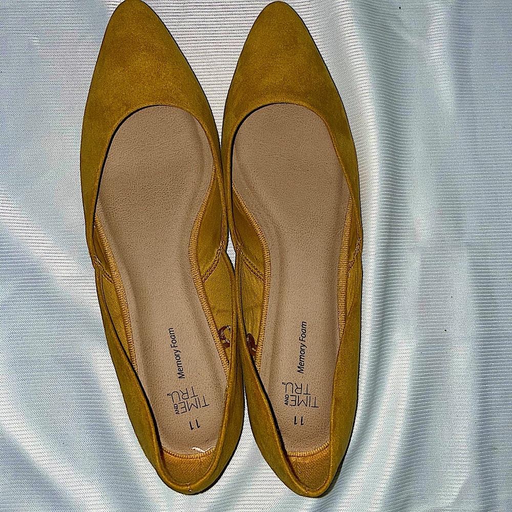 Mustard yellow and tan flats